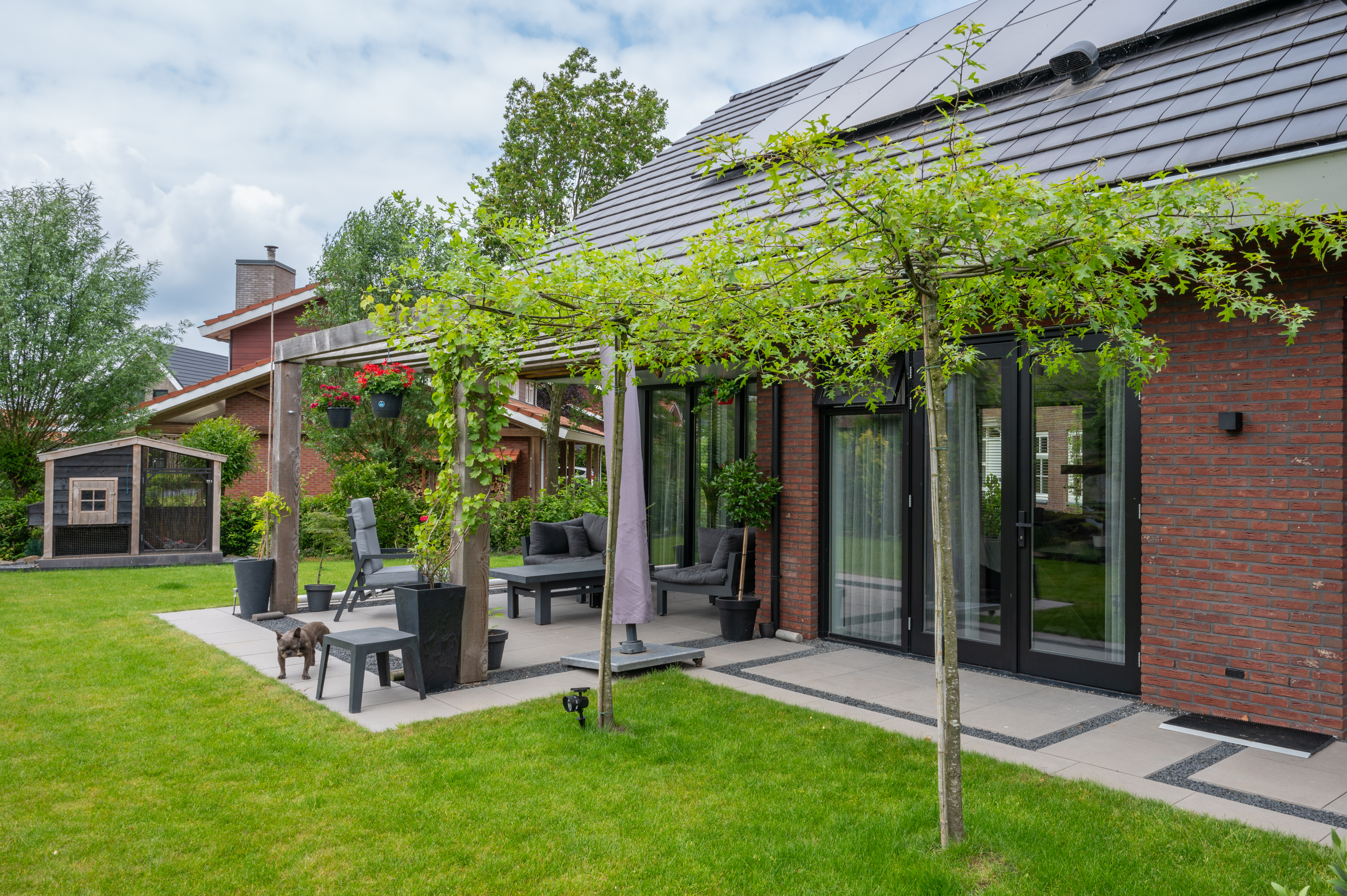 achterkant met gedeeltelijk ingebouwd terras vrijstaand huis in nieuwe wijk biddinghuizen gebouwd door bouwbedrijf w bouw